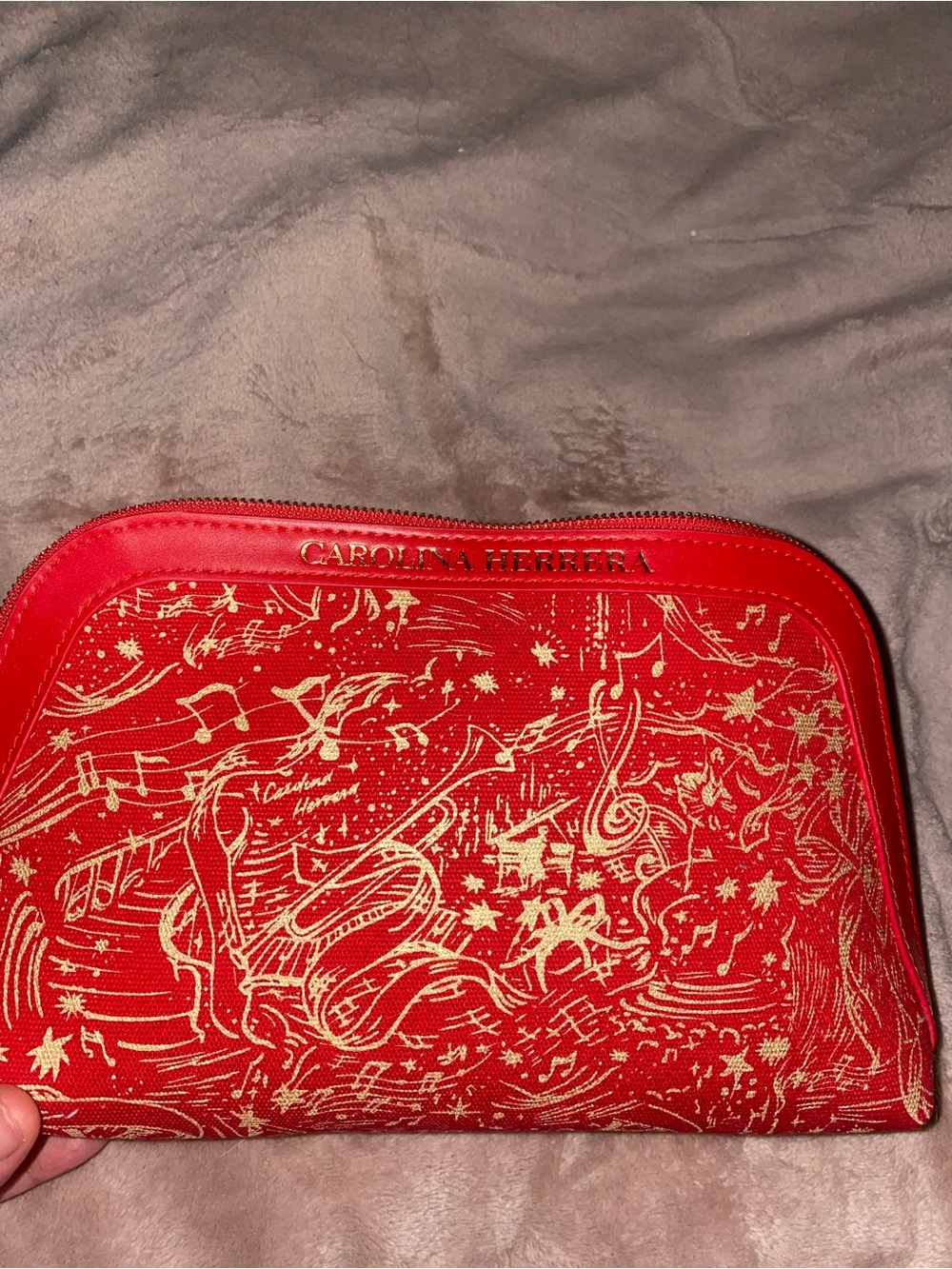 Carolina Herrera Red Cosmetic Pouch with Gold Musical Motif